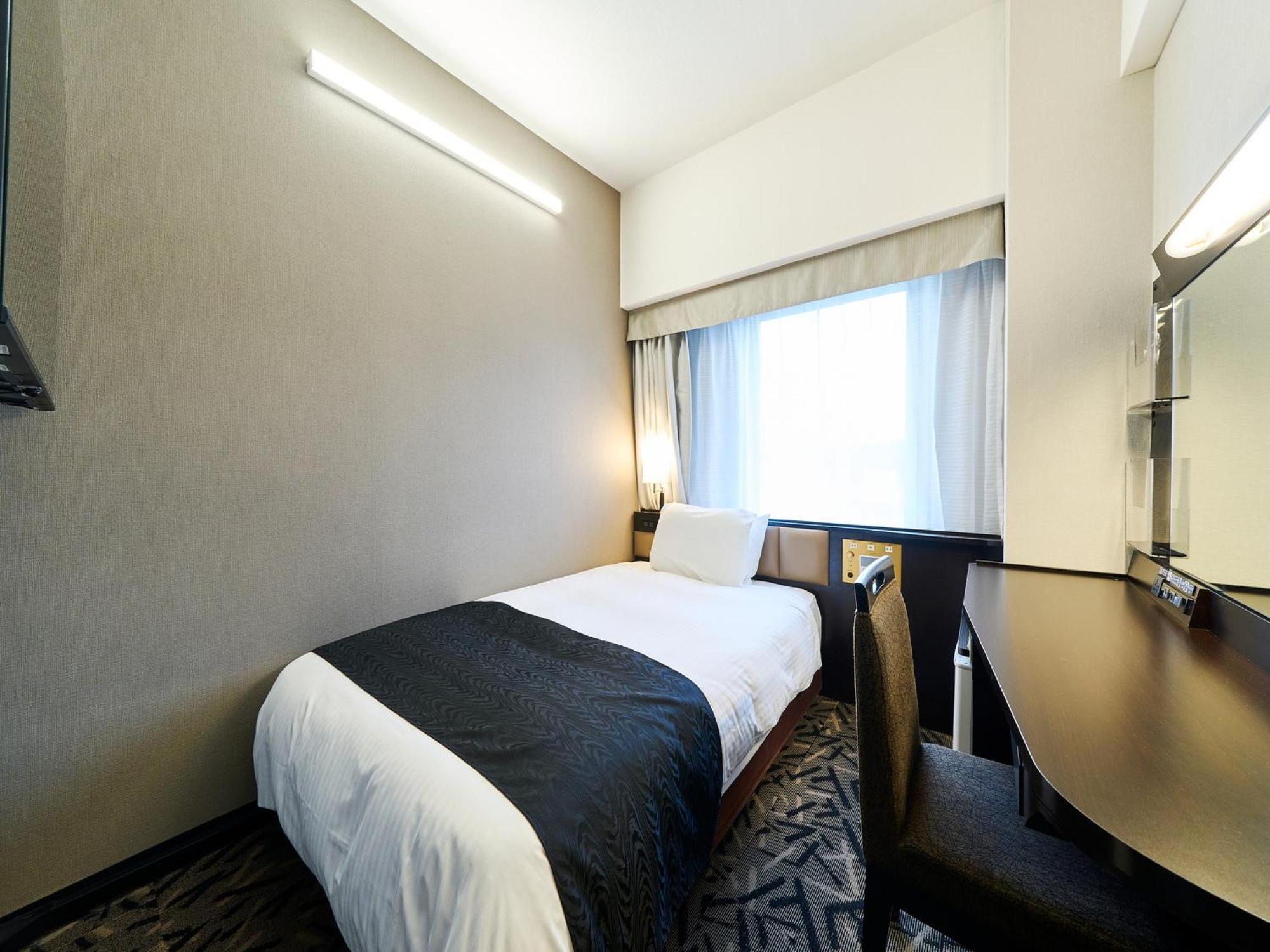 Apa Hotel Takaoka Marunouchi Esterno foto